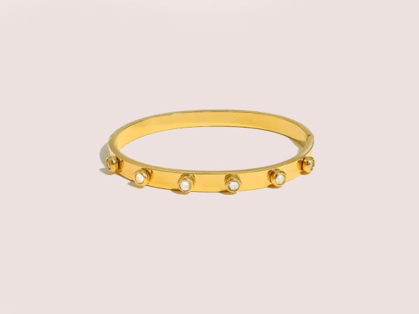 circle cubic zirconia bangle in gold